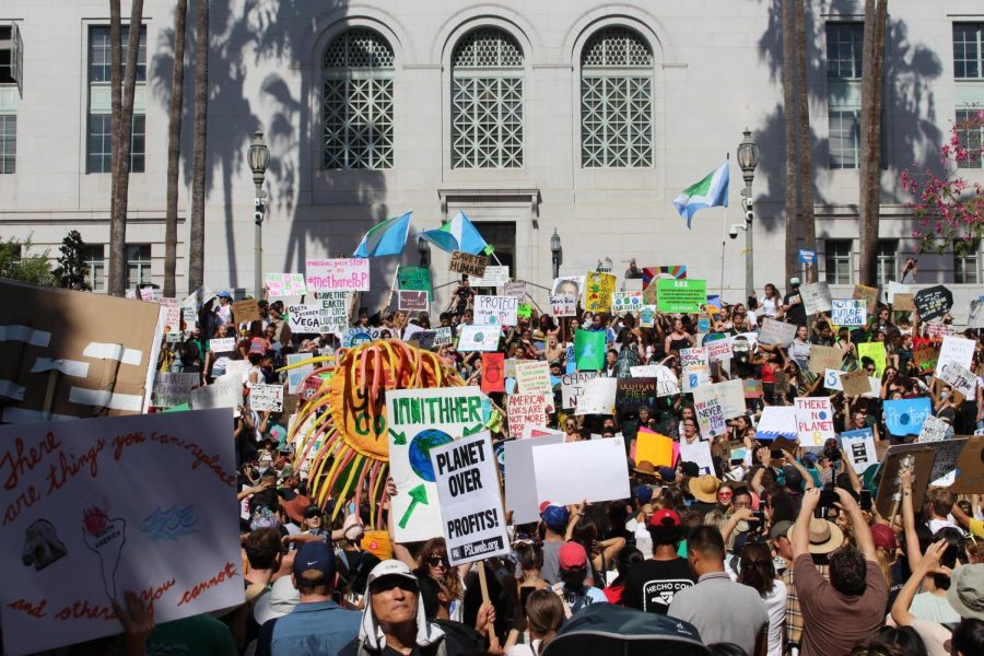 Strikers gather outside City Hall after an approximately mile-long walk from Pershing Square. CBS News estimated that thousands of Angelenos attended the demonstration. 