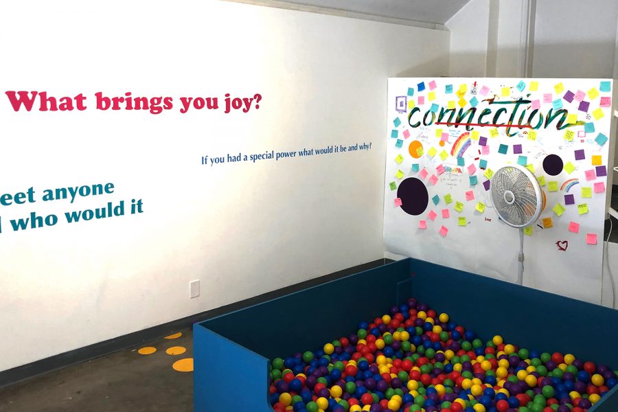 Director of Fine and Performing Arts, Reed Farley created this exhibit in the Gallery to foster connections. It features an interactive ball pit for students. 