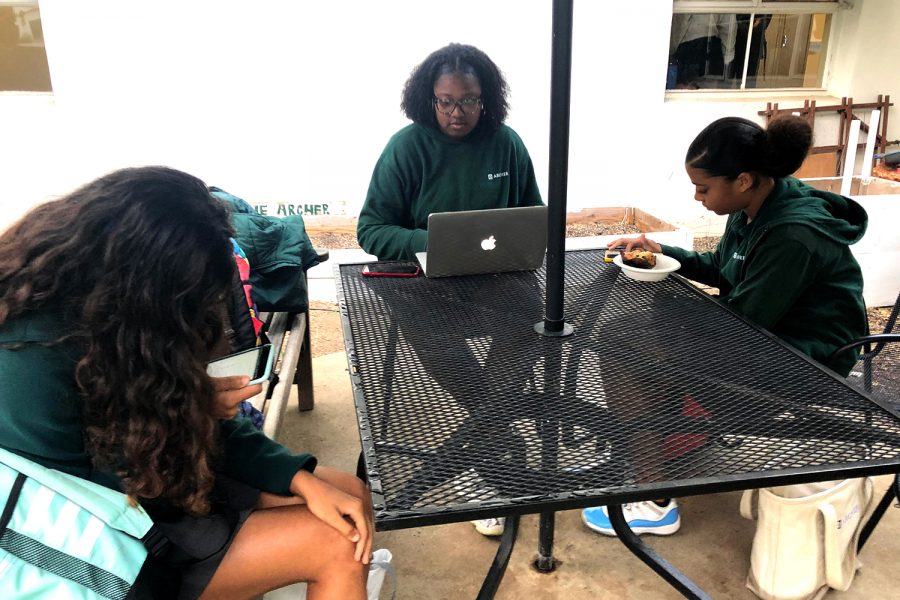 New freshmen Maya Kakani, Treasure Brown and London Dorton sit around the same courtyard table every morning. Brown said she can be more herself around people she feels comfortable with.