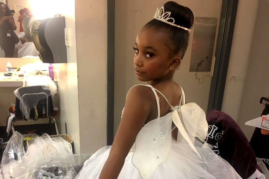 Seventh grader Sydney Curry prepares for a performance of the Hot Chocolate Nutcracker in a dressing room. This year was the 10th anniversary of Debbie Allens adaptation of the original The Nutcracker and the Mouse King ballet. Curry, who has been dancing since she was two, has danced in the show for four years. 