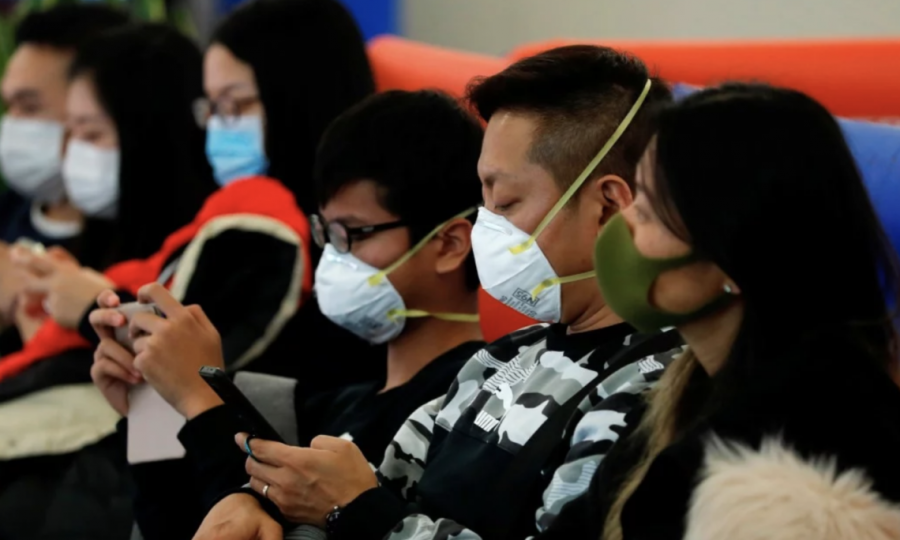 Several people are seen wearing respiratory masks to protect themselves from infection. The U.S. Embassy in Kazakhstan posted this photo on Jan. 24.