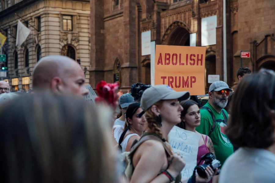 In the streets of New York City, people are protesting Donald Trump. All photos on Unsplash.com are relicensed for reuse. 