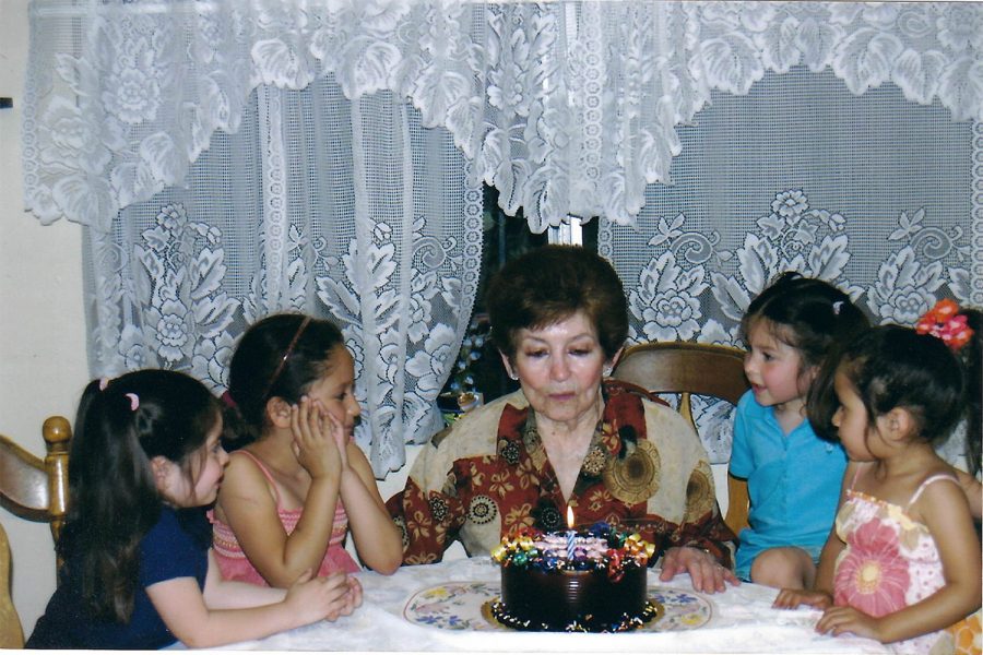 The image features my grandmother’s 80 birthday dinner with two of my cousins, my sister and myself surrounding her. My grandmothers skin tone was far lighter than either of my two cousins and more similar to me and my sister’s. 