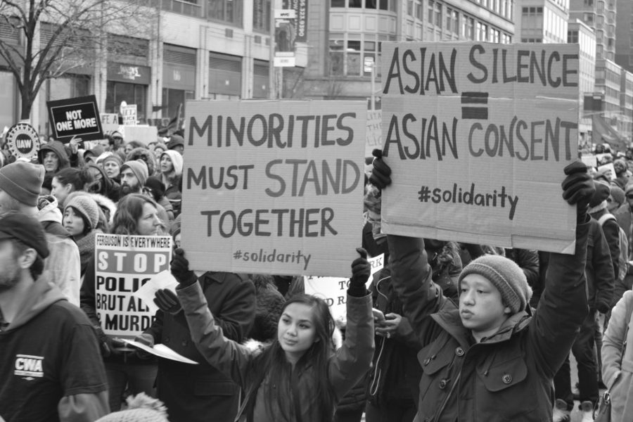 Asian Americans at a 2014 protest in New York. Anti-Asian violence has surged in the past year, but many Asian and Pacific Islander Americans have felt the effects of anti-Asian rhetoric throughout their lives. 