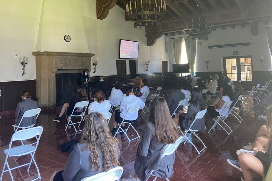 Senior Kaitlyn Kim presents to her classmates and faculty on An Analysis of the Failures of the American Medical System for Women of Color. Kims presentation was given in the dining hall and was based on the research from her semester-long Gender Studies seminar.
