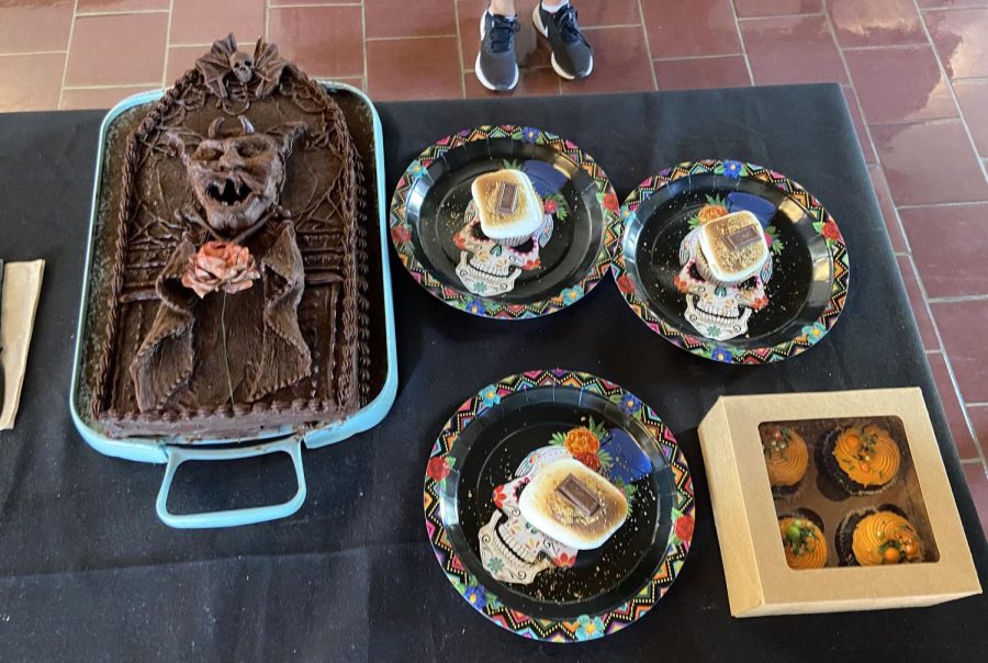 A table in the dining hall displays the treats for the annual 11th grade fall bake-off. The judges announced junior Lily Guggenheim's devil's food tombstone cake as the winner. 