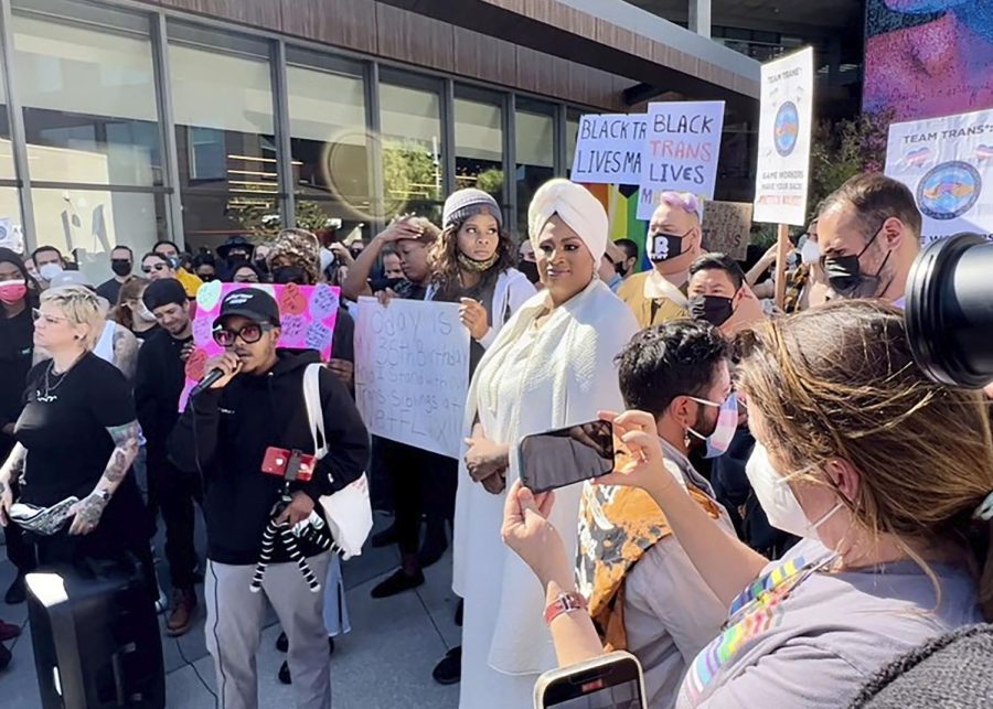Netflix workers and members of the entertainment industry gather to protest Netflixs protection of Dave Chappelle. The media giant has chosen to side with the comedian following backlash about anti-transgender comments he makes in his special.