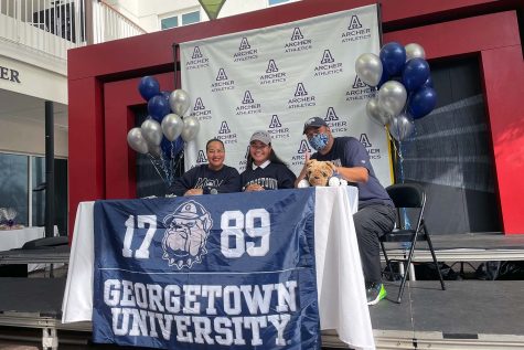 Vaughan, Tiffany and Reno Anoai smile after Vaughan officially signed her letter of intent to play at Georgetown University. According to Marissa Gendy, fellow senior, Vaughan has worked so hard, and will do incredible things in the future.