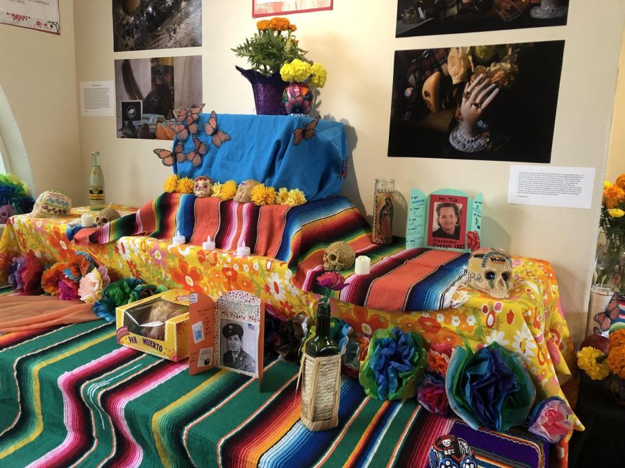 Archers annual altar for Dia de Los Muertos is located in the front hallway of the school. Students are welcomed to bring in photographs or items to place on the altar and the work of art and Spanish students are displayed as well.