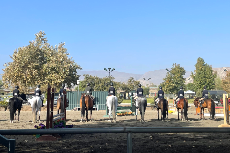 After the JV flat equitation round, the riders go to the middle of the ring while the scores are tallied. The Archer equestrian team competed in their first show of the season on Nov. 7 at Hansen Dam Equestrian Center.