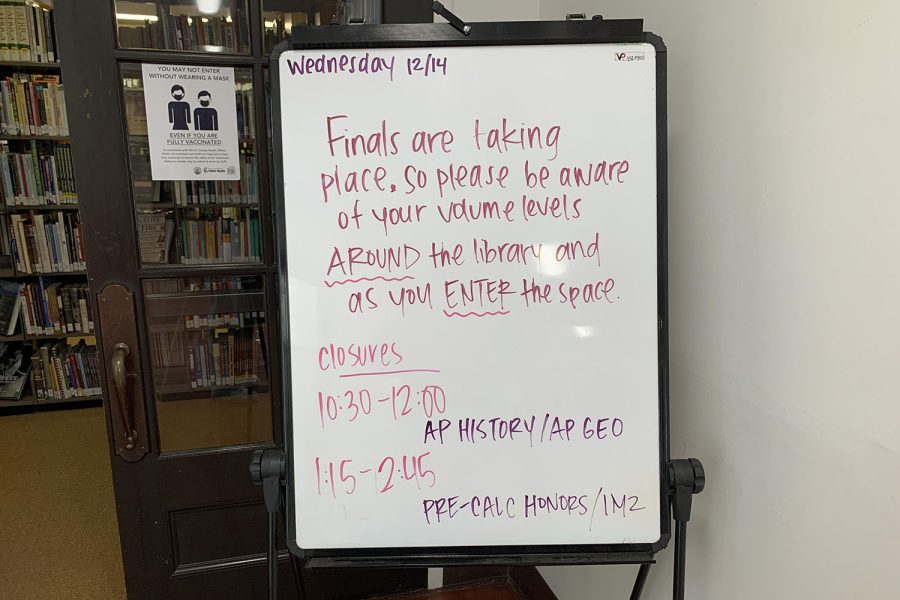 A board displayed outside the library on Wednesday, Dec. 15, the first day of finals. Since middle school students still follow the regular schedule, the board reminds them to please be quiet around campus. The first day of upper school exams was on Dec. 15 and continues through the rest of the week.