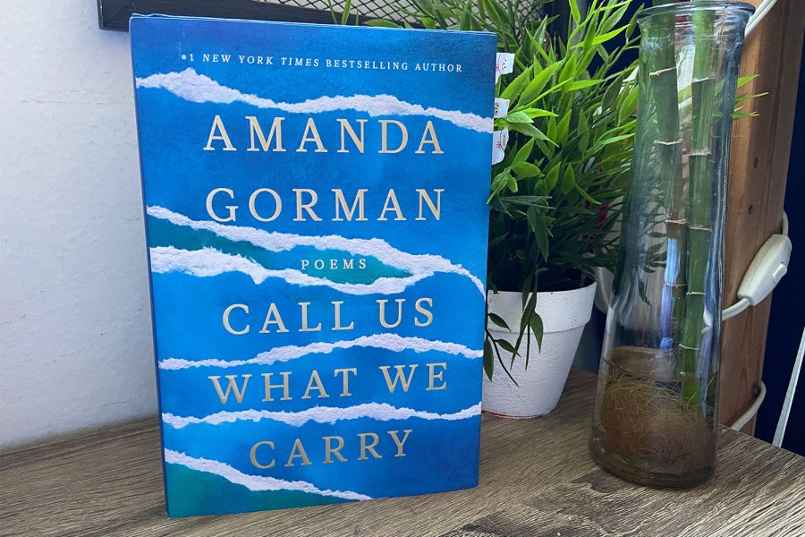 Amanda+Gormans+newest+poetry+book%2C+Call+Us+What+We+Carry%2C+sits+at+my+favorite+place+to+read%2C+on+my+desk+in+my+bedroom.%C2%A0Gormans+collection+of+poems+sailed+readers+through+the+storms+and+sunlight+of+this+past+year+to+reflect+upon+inner+emotions+and+refract+their+attention+to+forgotten+narratives.%C2%A0