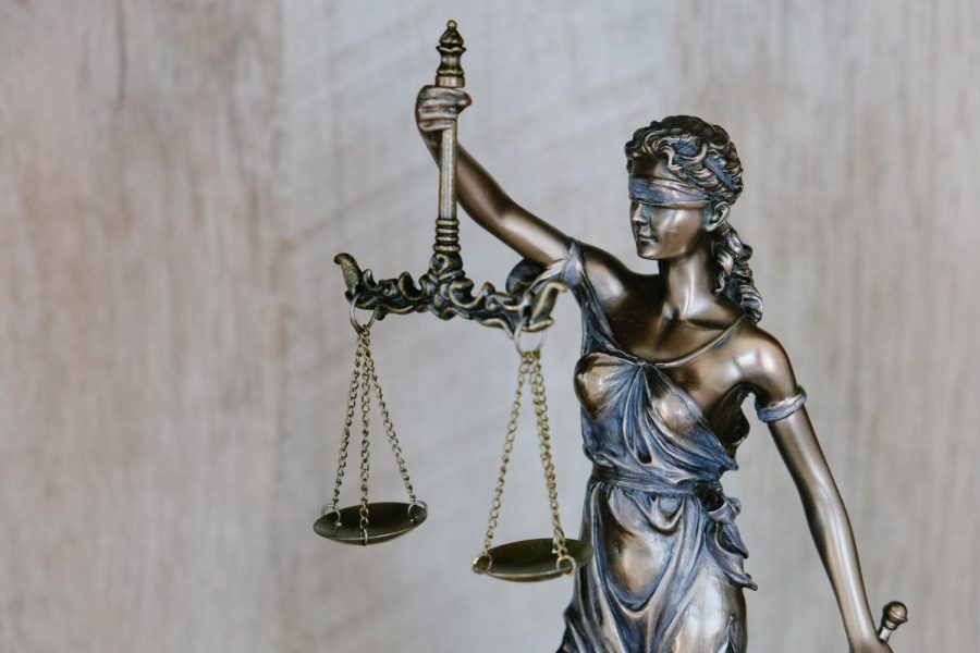 Lady justice holds an even scale. Criminal justice inequalities show how the scale of justice is not equal.
