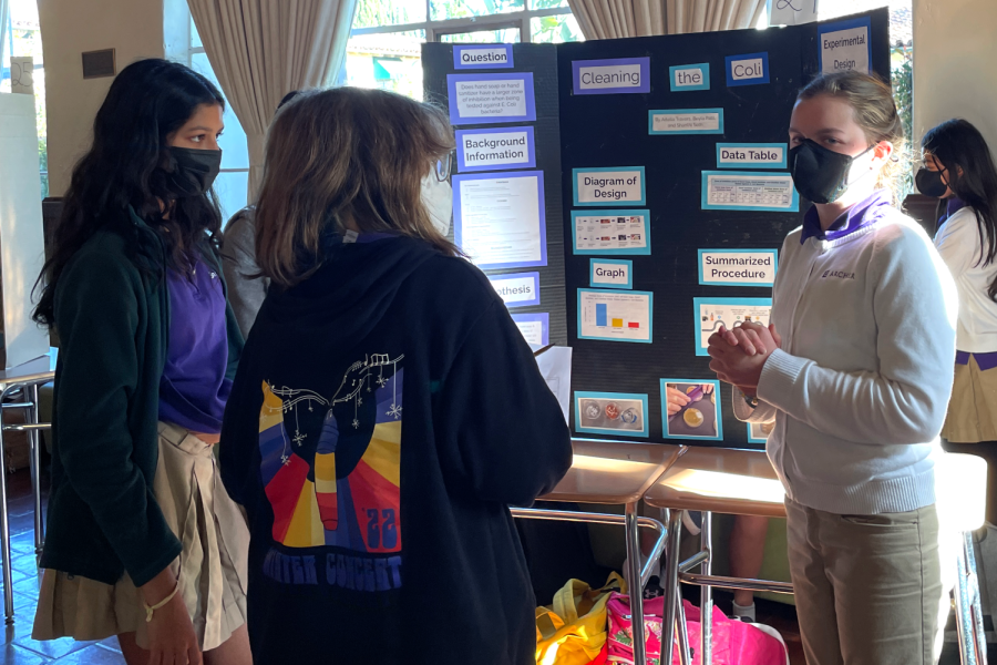 Shanthi Seth (27), Beyla Patil (27) and Adella Travers (27) present their poster showing their experiment to other middle schoolers. On Feb. 4, middle school students presented their research from their passion-driven science projects in the annual middle school science fair called Lil SIS.