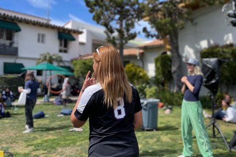 Seniors Cristina Fuentes and Presley Sacavitch play a volleyball game during Sports day. Fuentes slammed the ball onto a trampoline, sending it flying.