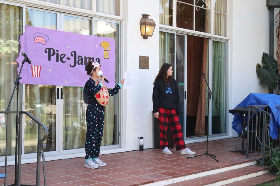 Student Body President Langdon Janos and freshman Julianna Hatton prepare the Archer community for the pie to the face Executive Board members Marissa Gendy and Bess Frierson are about to receive.
