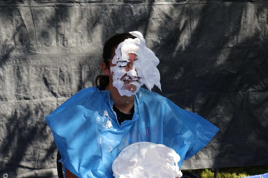 Senior Marissa Gendy gets a pie to the face. I just ate shaving cream, Gendy said.