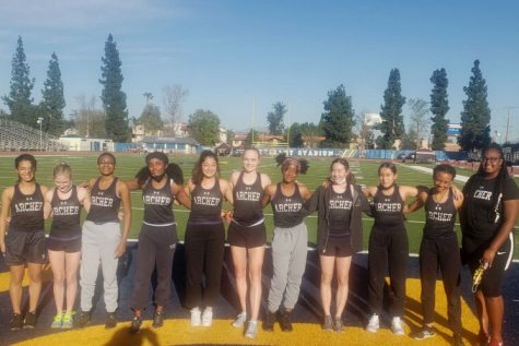 Archers varsity track and field team poses at their first Liberty League meet of the season, located at Birmingham High School. The 18 member team will continue competing through May.
