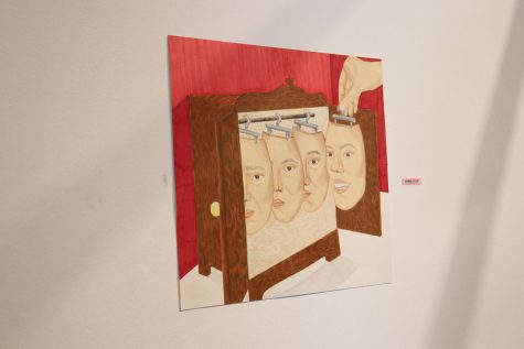 Created by Emily Cadenas ('22), she name the piece "Morning Routine." "A common theme with Emily's piece with the faces in the closet, you know, it's having to portray yourself differently in front of different people, I'd say is a big thing," Senior Audrey Chung ('22) said. "Trying to define yourself for who you are, instead of meeting the societal expectations. I think that was really cool that they integrated that into their gallery."