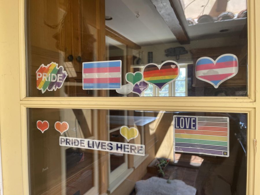 Stickers+line+the+outside+of+my+kitchen+window+promoting+pride+and+transgender+visibility.+There+are+many+ways+to+uplift+transgender+show+your+support+for+the+transgender+community+following+March+31.