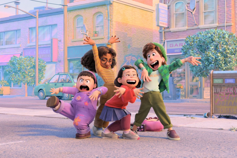 Meilin Lee (Rosalie Chiang), Miram (Ava Morse), Priya (Maitreyi Ramakrishnan) and Abby (Hyein Park) pose after singing a song from their favorite boy band 4-TOWN. Disneys latest animation Turning Red follows 13-year-old Meilin Lee as she explores her ability to transform into a red panda. The film was released on Disney Plus March 11.