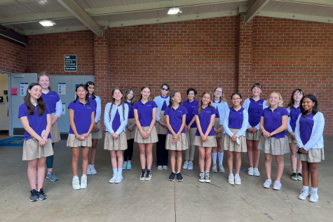 The Middle Cs finish singing for the Brentwood Earth Day celebration. Both the middle and upper school a cappella groups preformed a song during the event.