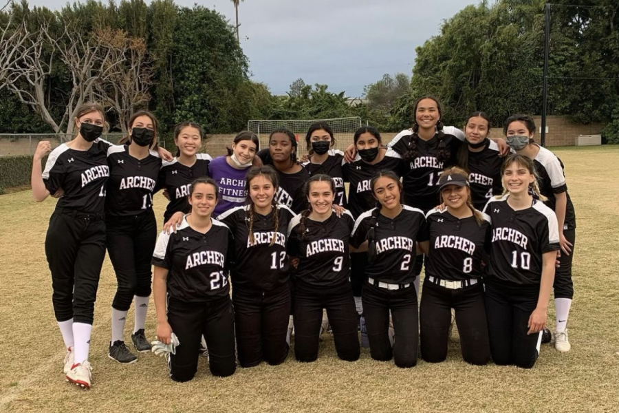 The+varsity+softball+team+poses+for+a+team+photo+after+their+game+against+Marymount.+The+team+won+with+a+score+of+16-6.+I+love+our+team+because+of+how+supportive+everyone+is+of+each+other%2C+Apor+said.+We+always+pick+each+other+up+after+a+loss+because+softball+is+a+big+game+of+mistakes%2C+and+it%E2%80%99s+the+only+way+we+will+get+better.