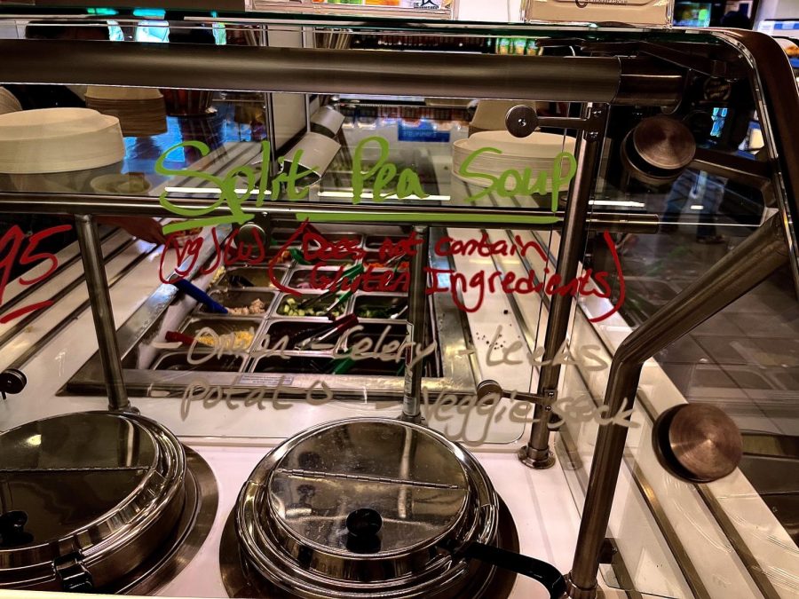 The writing on the glass refers to one of the soups of the day, and reads does not contain gluten ingredients. Meghan Lambert, director of dining services, said the servery aims to have at least one, if not both, of the soups of the day be gluten-free.