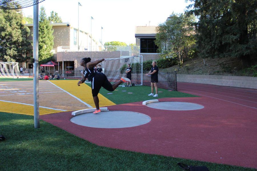Junior+Treasure+Brown+throws+the+shot+put+as+she+competes+in+the+event.+Varsity+track+and+field+went+to+Harvard+Westlake+Wednesday%2C+March+23%2C+to+compete+in+this+league+meet.+The+team+consistently+placed+top+three+in+their+league+meets+and+are+the+2022+Liberty+League+Champions.