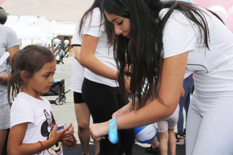 Delara Tehranchi connects with foster youth during Cocos Angels annual Back to School event. This year, the event has expanded to now provide educational resources and tutoring services. 