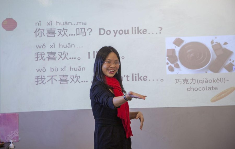 Chinese teacher Pei-Ying Gosselin teaches parents introductory Chinese phrases during the Archer School for Parents language learning event. She said the lesson gave parents a similar experience to connect to their child when their child has questions or struggles in class.