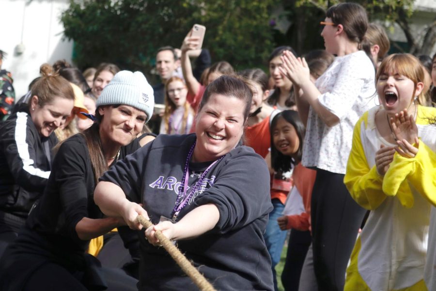English teacher Lauren Sekula, history teacher Emily Gray and math teacher Maggie Cenan participate in a tug-of-war competition. They won against the 11th grade and ultimately lost against the seniors during this year’s annual Color Wars, which took place Friday, Feb. 3.