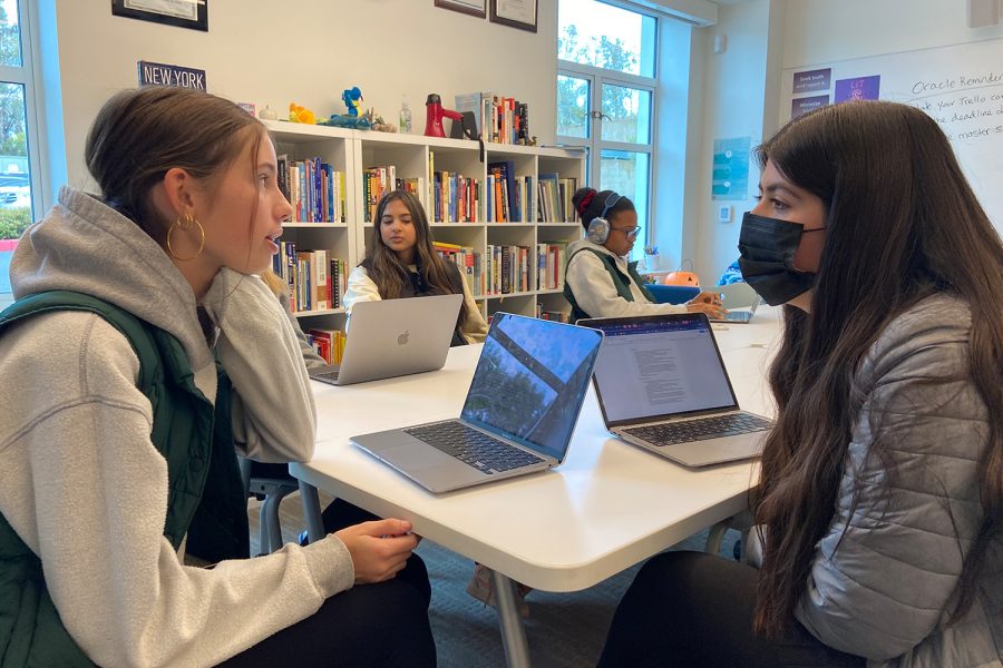 Oracle staff members discuss and edit articles. Layout and Design Editor of Archer’s yearbook Lucia Ponti (’24) and Sports Editor Surya Patil (’25) said they ensure every story has three sources, follows AP-Style rules and includes fact-checked information.