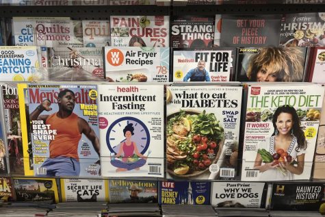 CVS's magazine section contains numerous magazines featuring ways to get in shape and diets to follow. In elementary school girls who read magazines, around 69% say that the magazine influences their idea of the "perfect" body, and 47% say that they make them want to lose weight. (Photo Credit: Olivia Hallinan-Gan)