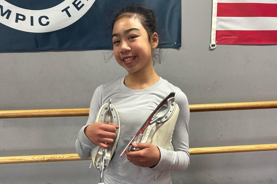 Seventh grader Kaia Soni holds her ice skates in the Moxie Elite Training gym. This was taken after her Wednesday figure skating practice.