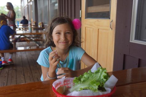 8-year-old Francie prepares to dive into her delicious lettuce wrapped burger. I call this one, No bun, no problems.