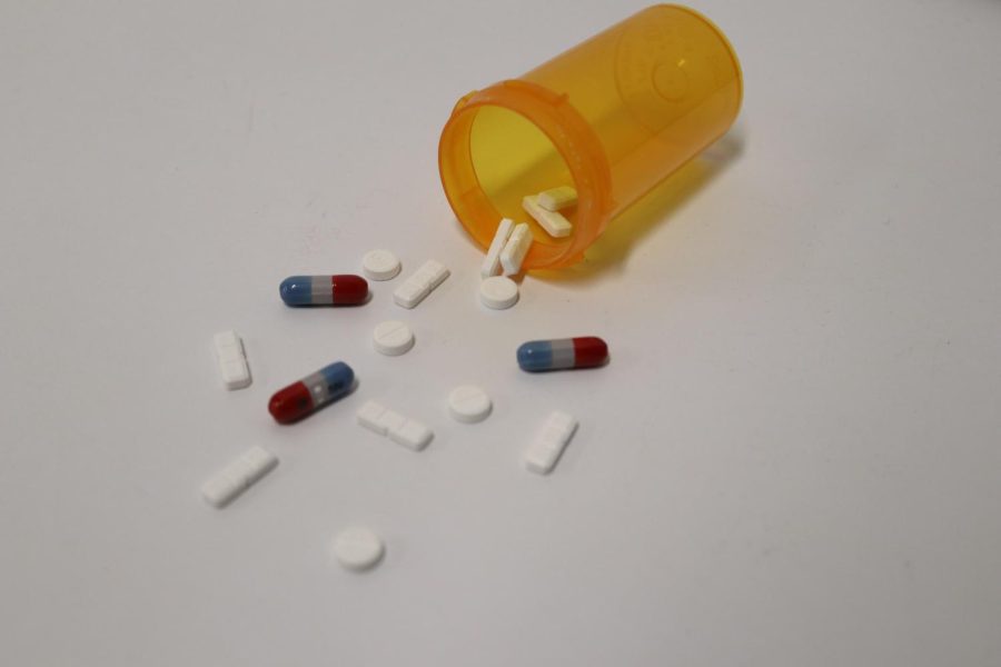 Various medications spill out of a pill bottle. According to Harvard Health Publishing, antidepressants are one of the most common ways to treat many mental health disorders but they do not work very well without therapeutic support. It [medication] treats the symptom, not the root of the issue  Licensed marriage and family therapist Natalie Kazarian said