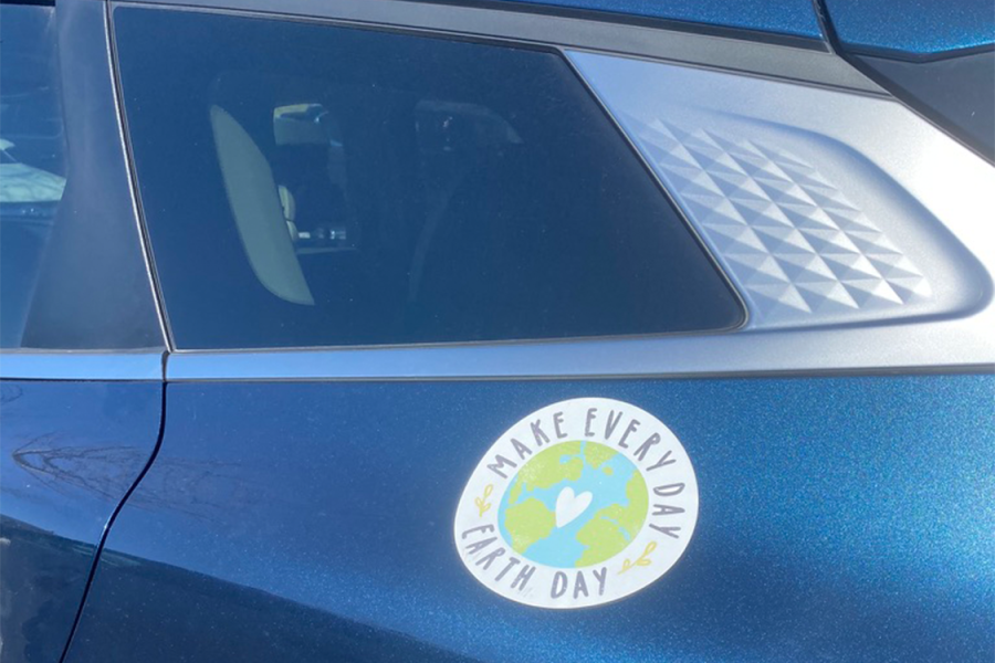 A bumper sticker with a picture of the Earth accompanied by the slogan, Make Everyday Earth Day, is displayed on a blue car. This sticker highlights the flaws within societys current Earth Day celebrations and calls for actions that make each day Earth Day.