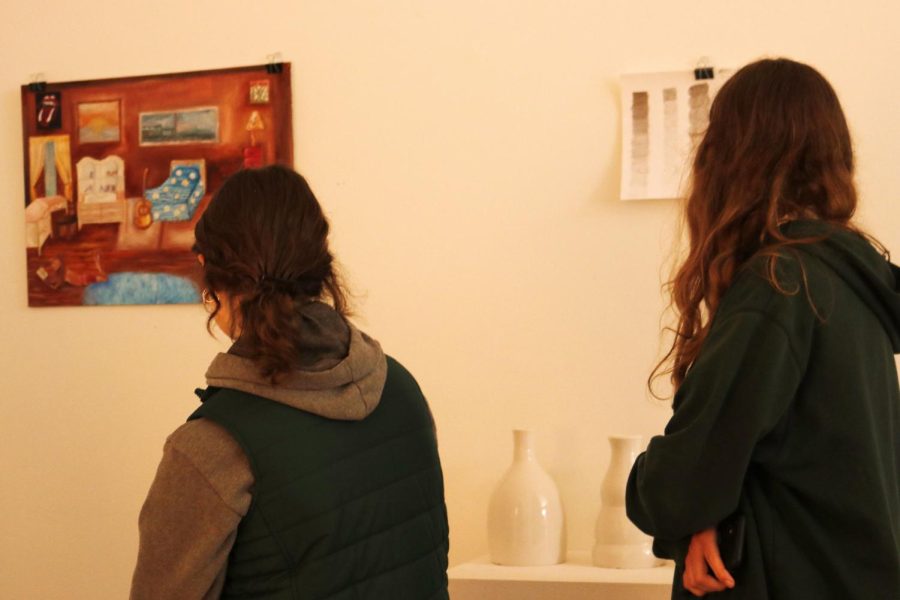 Two archer students visit the Senior Visual Arts show. The show, displaying works by Mia Makower, Lucy Lassman and Georgia Ehrlich, first opened Wed. April 12 and closed April 14.