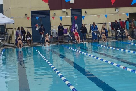 Archer swimmers dive into Crossroads pool for their seventh meet of the season. " it [sports] has kind of conditioned me. If I get scraped my knee or something else to complain about, I just keep moving on." Jones said.