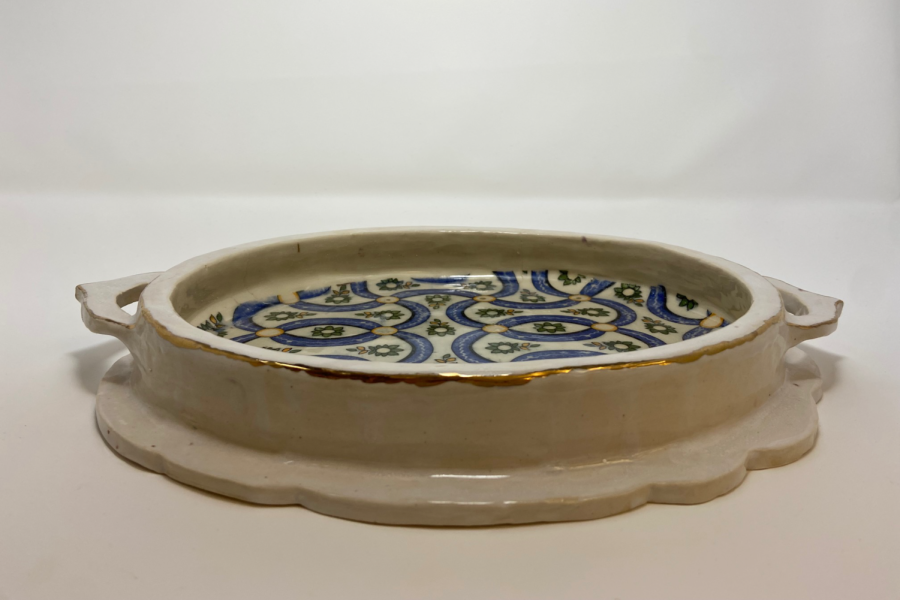 Junior Julissa Espinozas ceramic platter won an honorable mention in the 2022 Annual High School Ceramics Exhibition at AMOCA. Espinoza said she is very passionate about the arts and displays this love through her involvement in the Eastern Star Gallery and ceramics classes. 