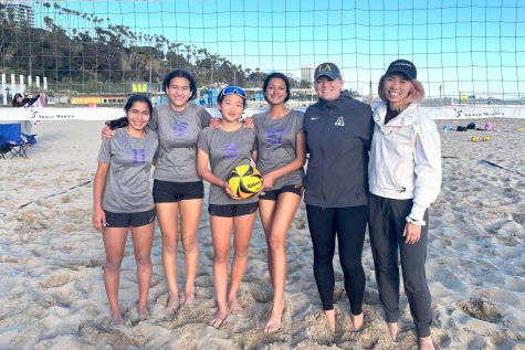 Finalist pairs smile after playing Windward in the PBL championship. Eighth grader Hana Cho said the team made major progress since the beginning of the beach volleyball program and overcame challenges throughout the season.