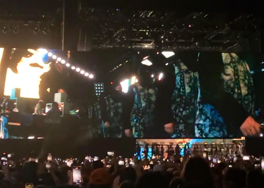 Backup dancers walk out on to the stage for Frank Oceans performance. All of the backup dancers were set to ice skate around the stage; however, at the last minute, Ocean chose to change the entire set.
