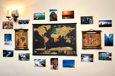 A few pictures that Director of College Guidance Ivan Hauck took sit on Hauck’s office wall. Hauck enjoys taking photos while he travels around the world. Hauck said one of his images was “taken when [he] was glacier climbing in Norway.”