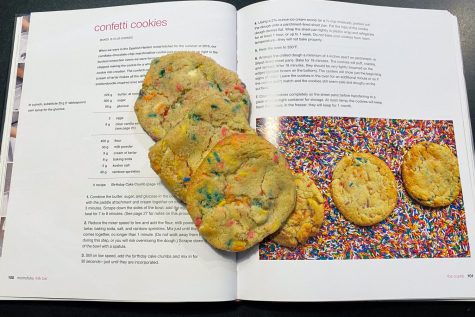 The birthday cake cookies I made using the Momofuku Milk Bar cookbook sit on top of the recipe. The recipe was straightforward and made the most delicious cookies.