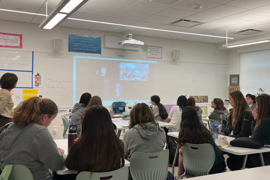 Students and faculty listen to Ukrainian students Kateryna Kischynska and Sofia Turanska speak about their altered lifestyles due to the war with Russia. The Q&A session took place Tuesday, May 9, in history teacher and Director of the Artemis Center Beth Golds classroom.
