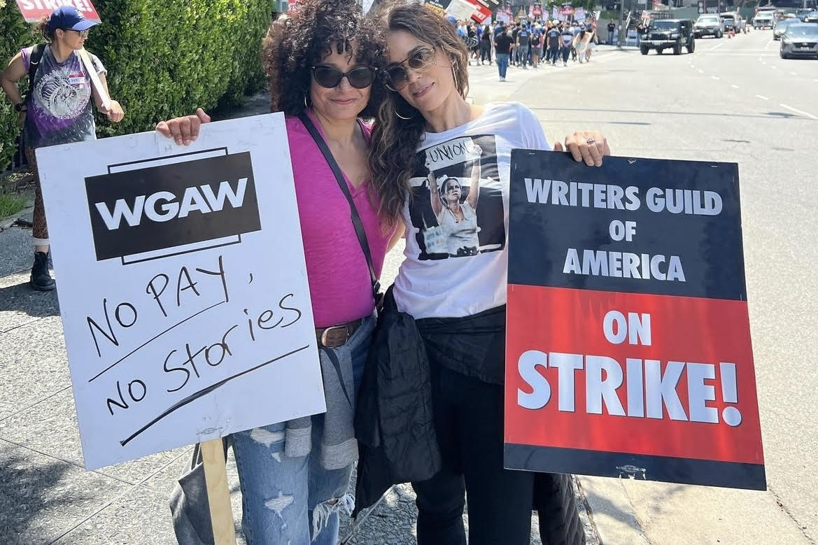Actresses+Judy+Reyes+and+Ana+Ortiz%C2%A0picket+at+the+Writers+Guild+Association+strike+May+8.+Ortiz+has+been+attending+WGA+and+SAG-AFTRA+protests+almost+daily+since+the+start+of+the+unions%E2%80%99+strikes.