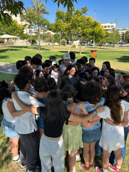 The 46 American and Israeli teens of Yallah Israel! Bus 2 hug before saying goodbye to our Israeli friends for the last time. Leaving Israel this summer was one of the hardest things Ive had to do. Even after only knowing my Israeli friends for one week, nothing upsets me more than seeing their beautiful country being destroyed.