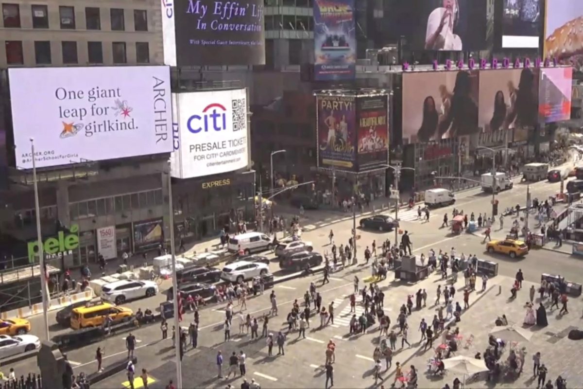 Archer promotes their recent rebrand on a Times Square billboard that reads, “One giant leap for girlkind,” Monday, Oct. 2. The billboard sparked controversy among students regarding its location and potential financial ramifications.