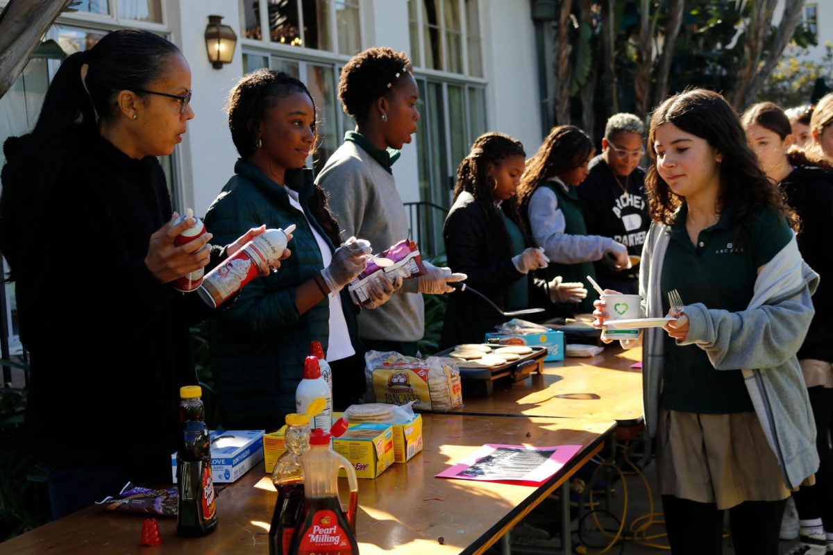 Black Student Union members serve students at their pancake breakfast Thursday, Jan. 11. BSU held the breakfast to honor the legacy of the Black Panther Party. 